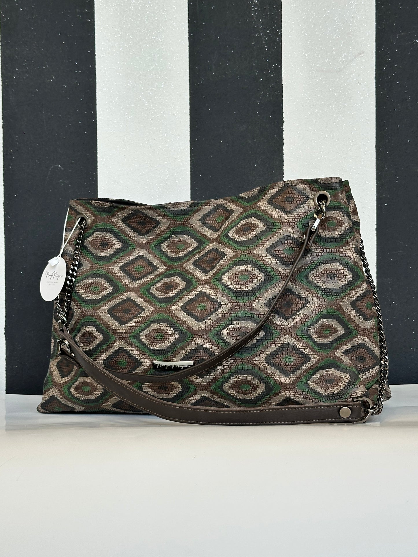 Borsa artigianale a spalla e tracolla in vera pelle con fantasia geometrica. Modello Ismi di Nany Magenis
