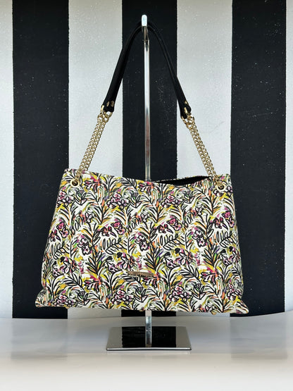 Borsa artigianale a spalla e tracolla in vera pelle con fantasia floreale. Modello Ismi di Nany Magenis