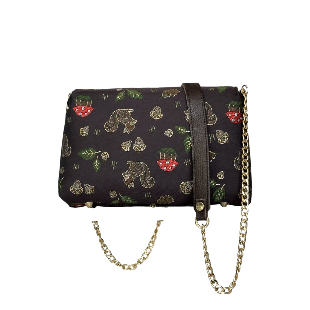 Borsa Artigianale Amada in tessuto con trama animalier nero con catena regolabile di Nany Magenis