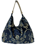 Borsa artigianale a spalla in tessuto con fantasia floreale jeans. Modello Sacca di Nany Magenis