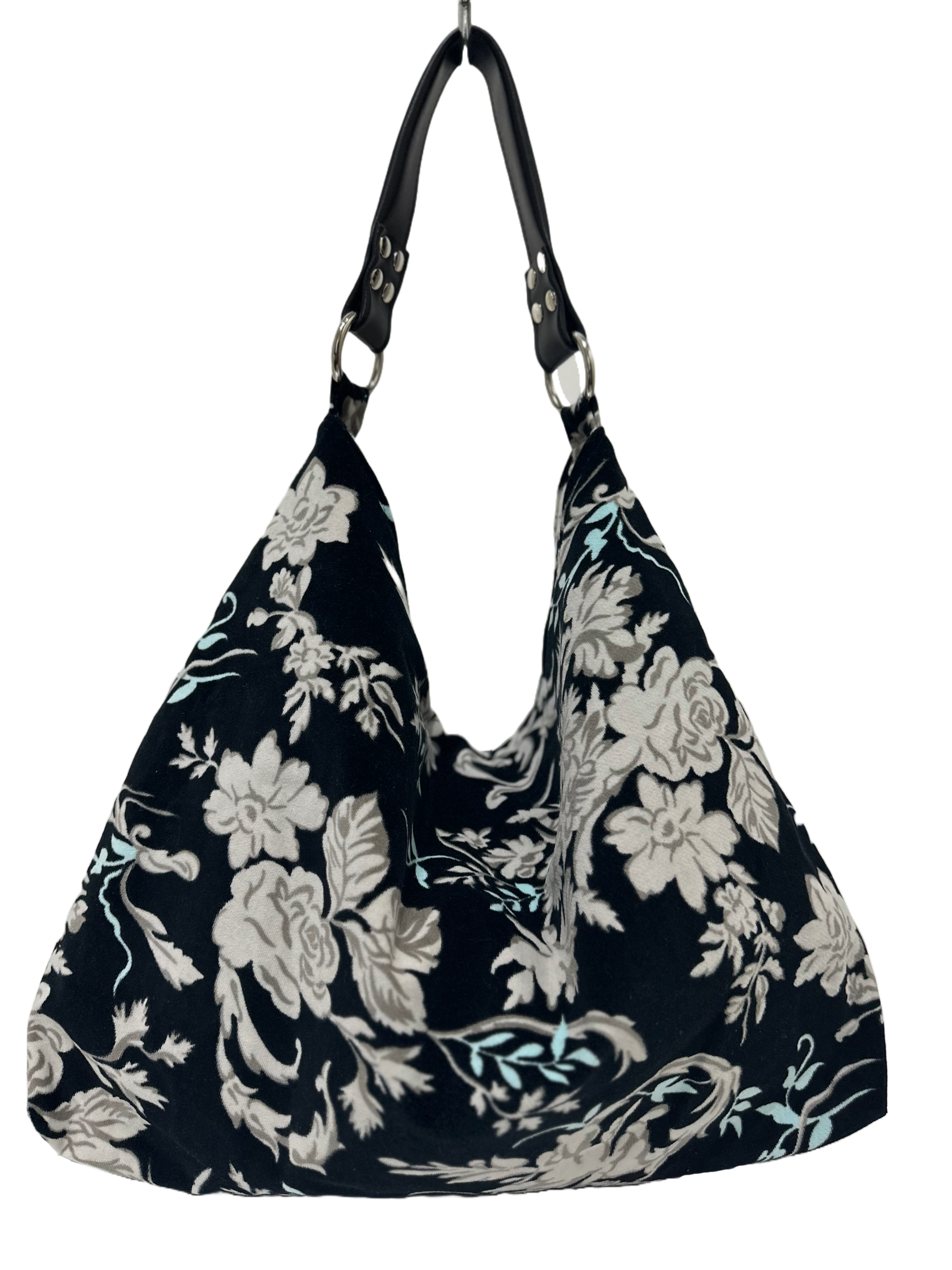 Borsa artigianale a spalla in tessuto con fantasia floreale. Modello Sacca di Nany Magenis